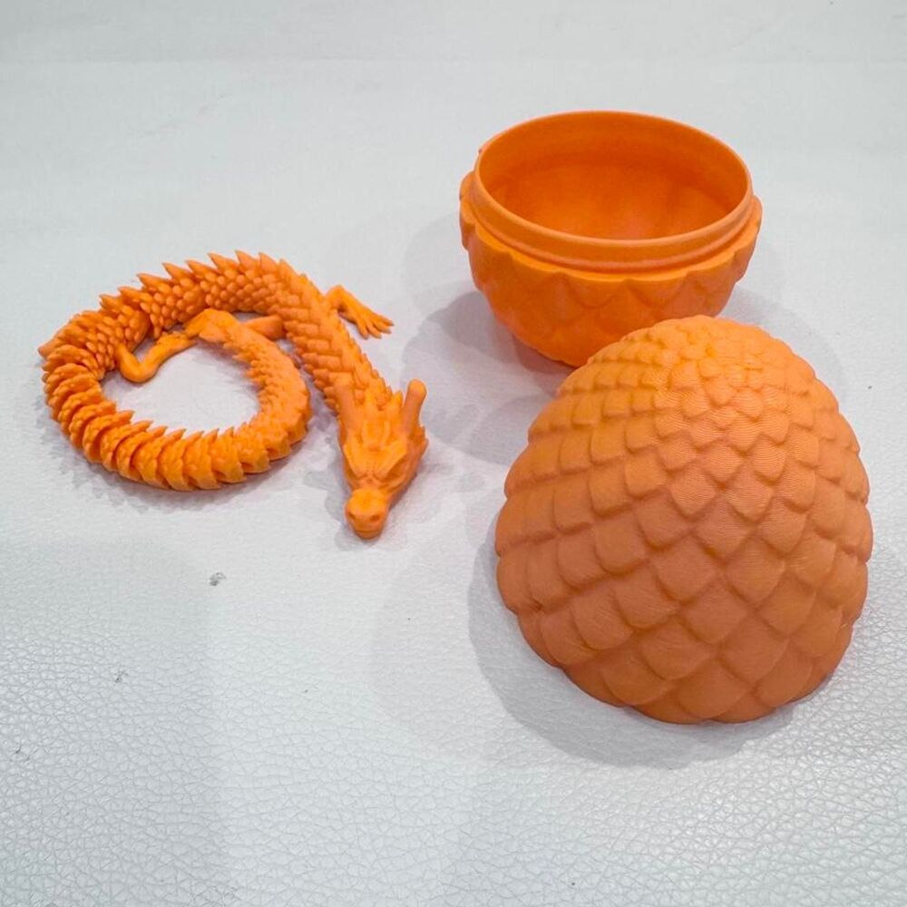 Orange dragon in egg